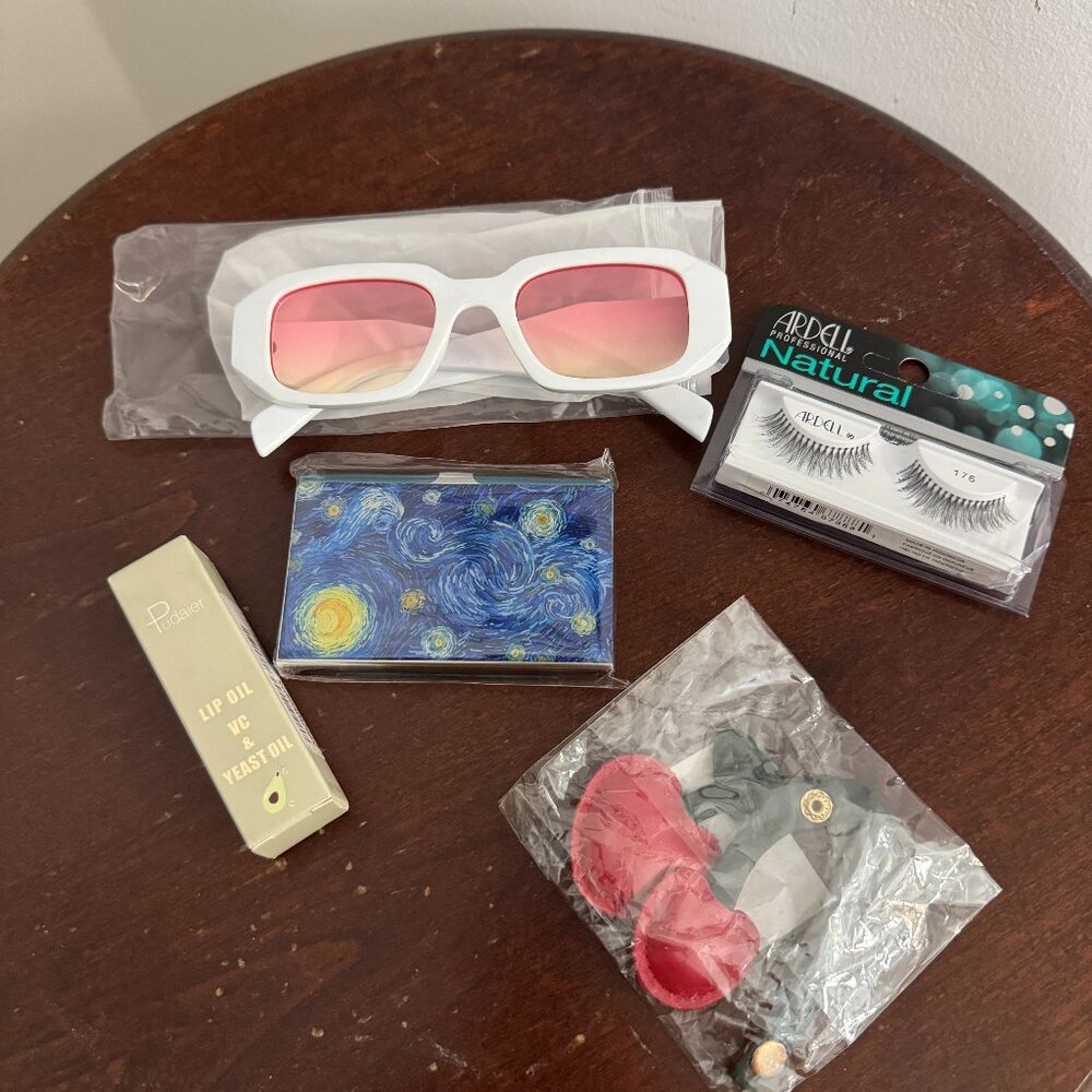 Sunglasses, Lip Oil, Pimple Patches and Cherry Bag Charm. New